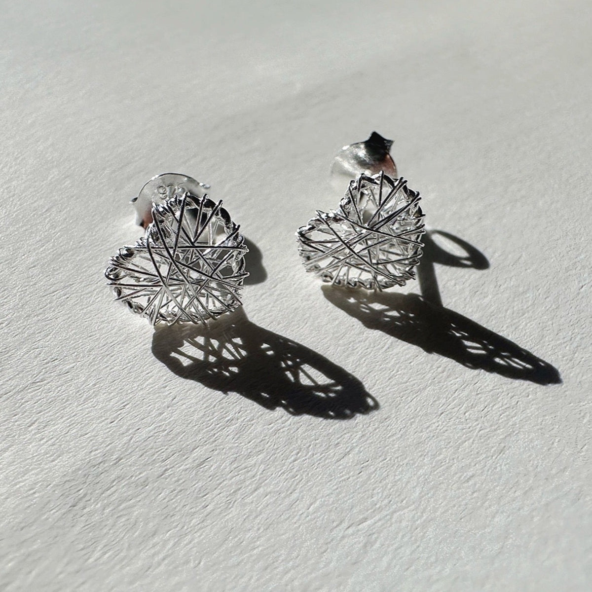 Issa Heart Stud Earrings
