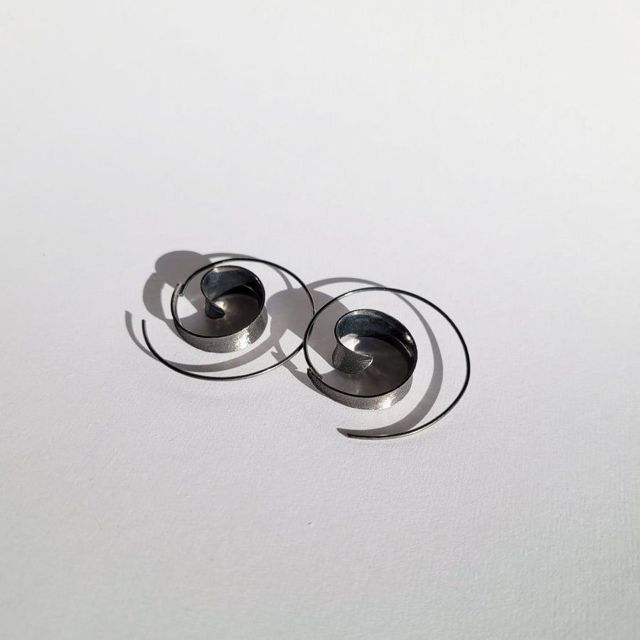 Coil Silver Rhodium Statement Earrings